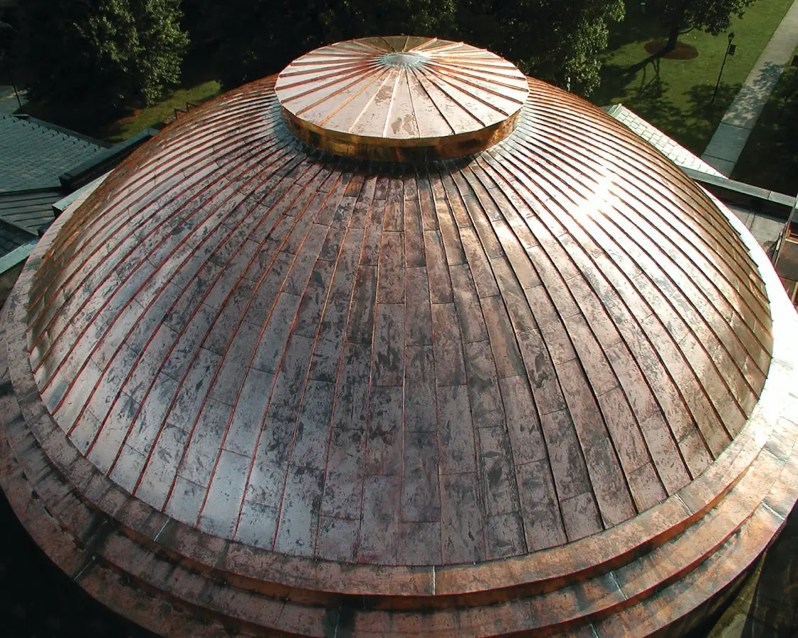 Craftsman Roofing crew installing a new roof in South Brookline